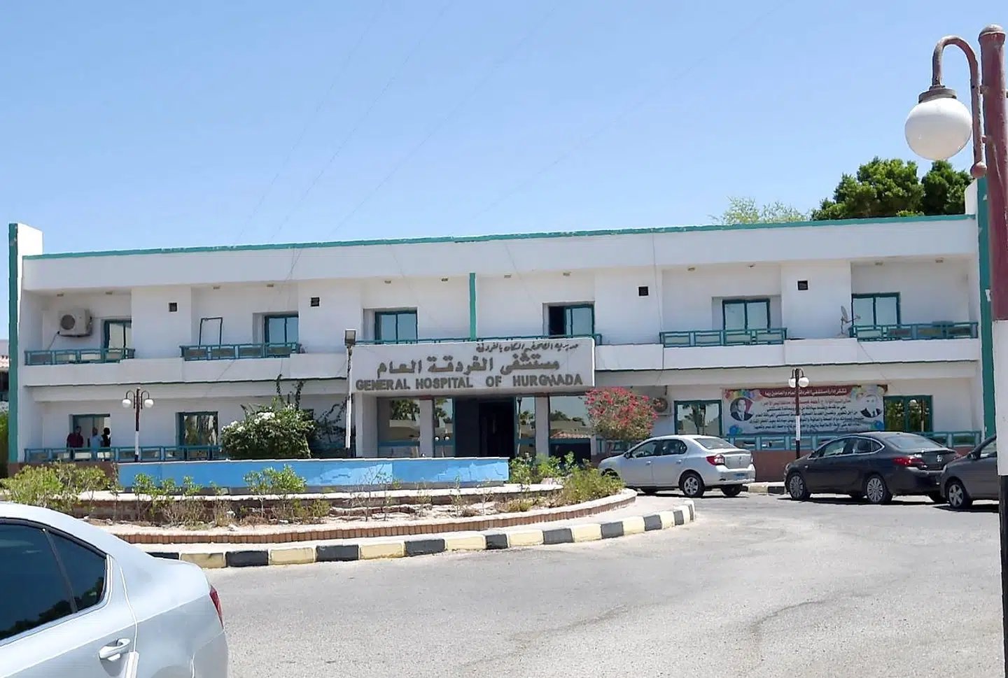 A picture taken on August 25, 2018 shows the entrance of the General Hospital of Hurghada in Egypt's Red Sea resort to which a British couple on holiday who died within hours of each other were transported a day before. - Engineers have found no fault in the air conditioning unit or any other equipment in their hotel room, the public prosecutor said today. (Photo by MOHAMED EL-SHAHED / AFP)