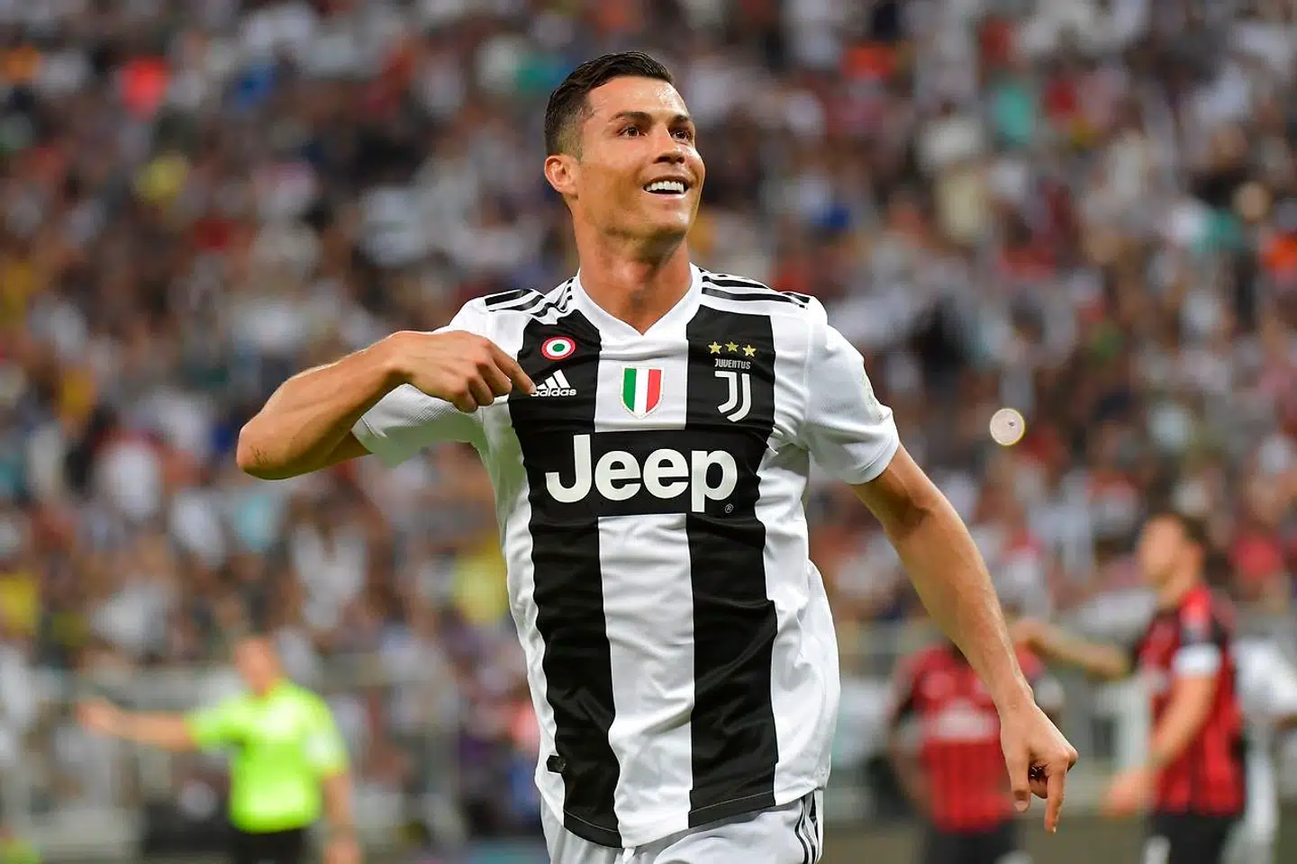 Juventus' Portuguese forward Cristiano Ronaldo celebrates his goal during their Supercoppa Italiana final between Juventus and AC Milan at the King Abdullah Sports City Stadium in Jeddah on January 16, 2019. (Photo by GIUSEPPE CACACE / AFP)