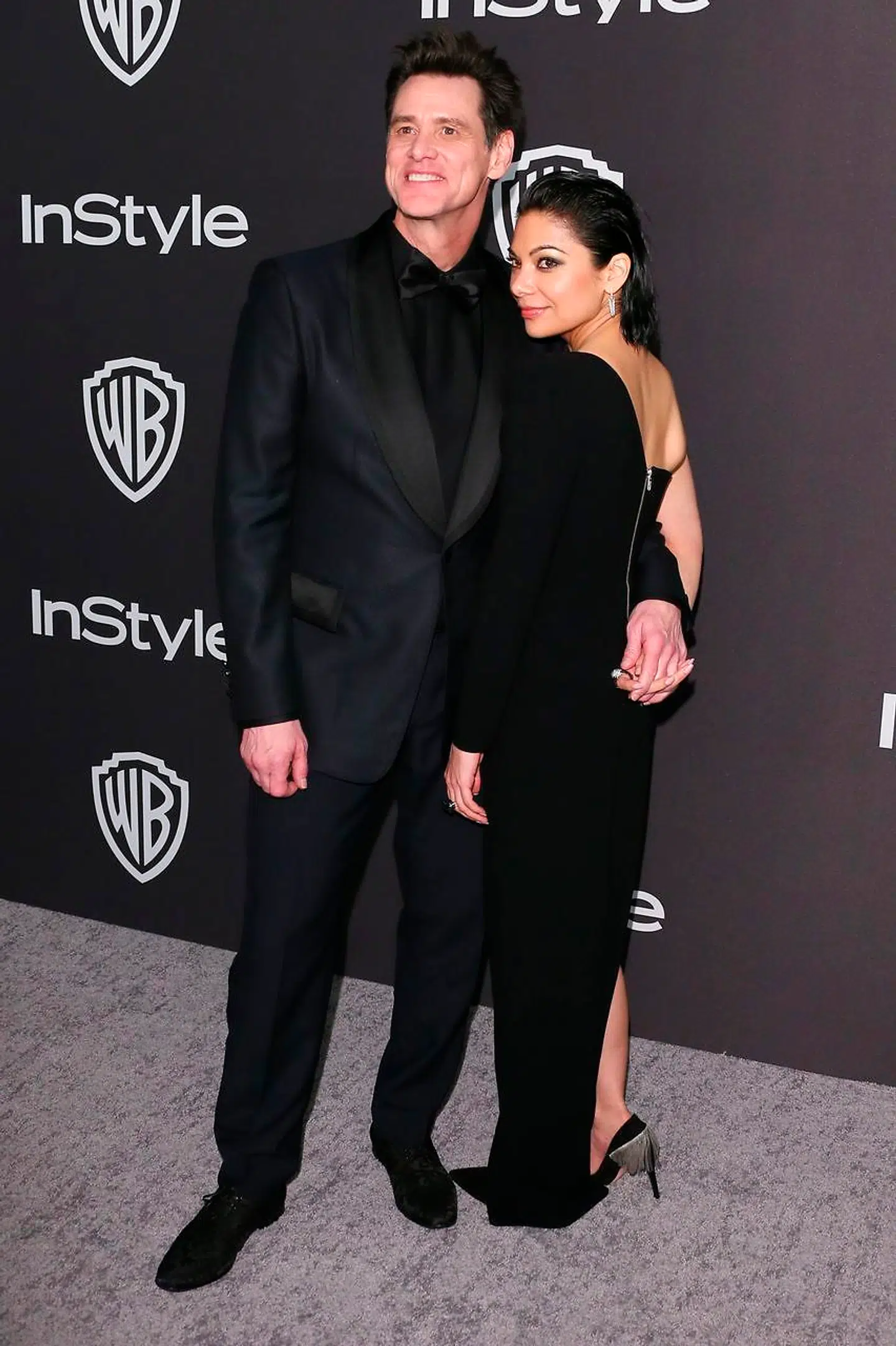 Her ses parret på den røde løber til en fest efter award-showet.