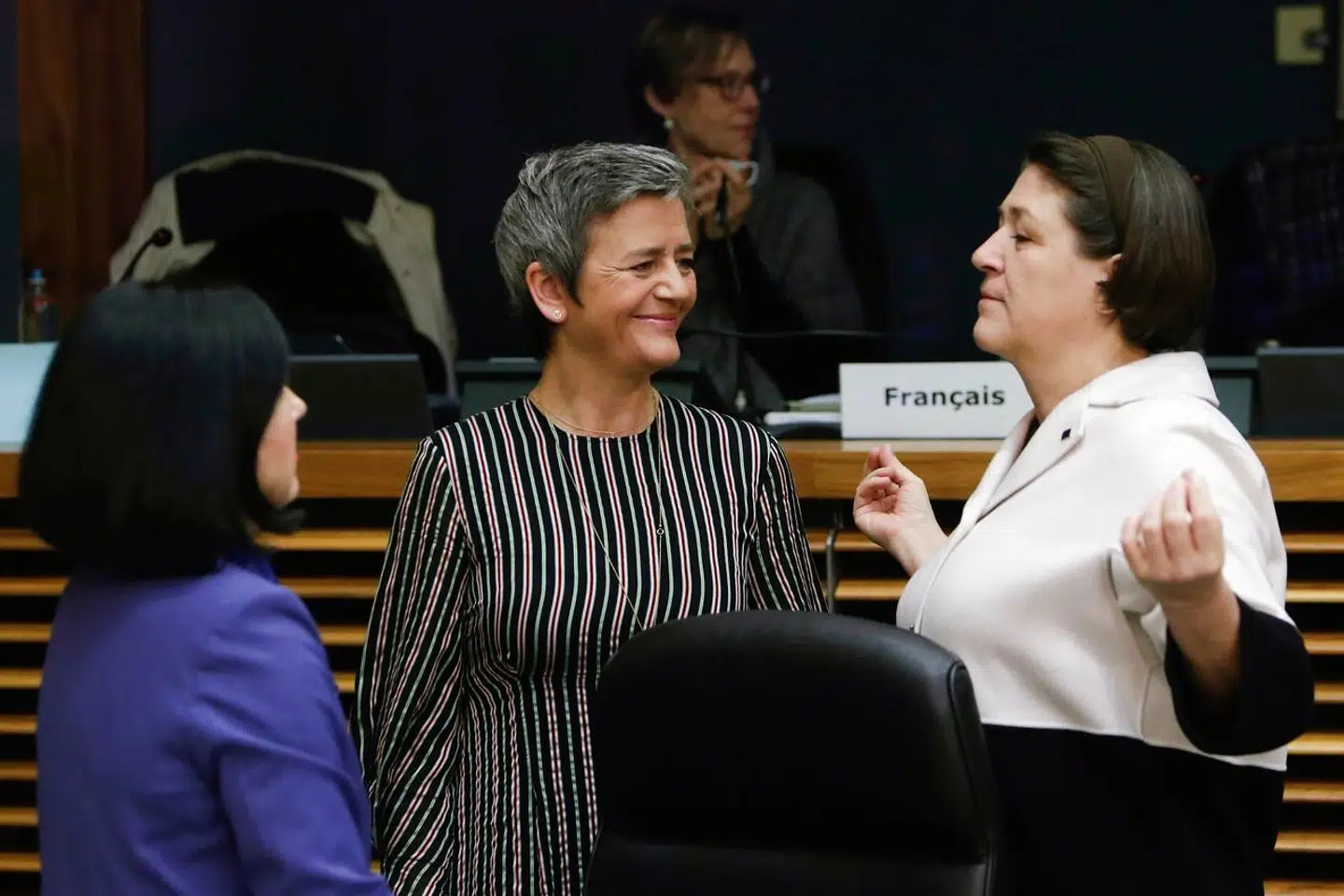 (From L to R) EU commissioner for Justice, consumers and gender equality Vera Jourova, EU Commissioner for Competition Margrethe Vestager, and EU Commissioner for Transport Violeta Bulc speak prior to the EU Commissioners weekly college meeting at The European Commission headquarters in Brussels, on December 19, 2018. (Photo by Aris OIKONOMOU / AFP)