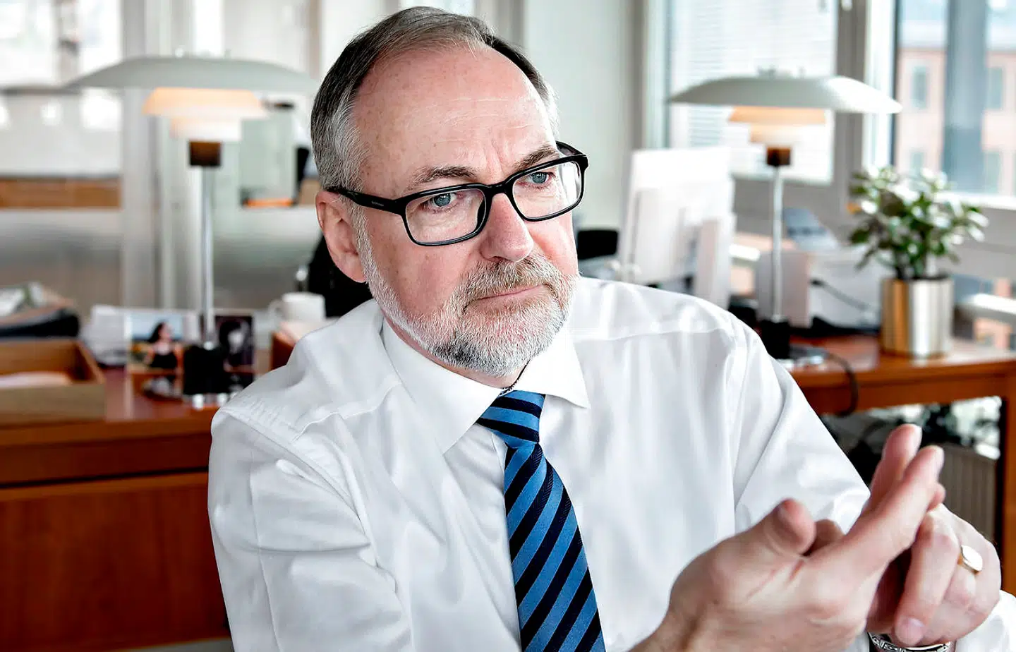 John Wagner, administrerende direktør for De Samvirkende Købmænd, inviterer også de afskedigede medarbejdere til at søge job.