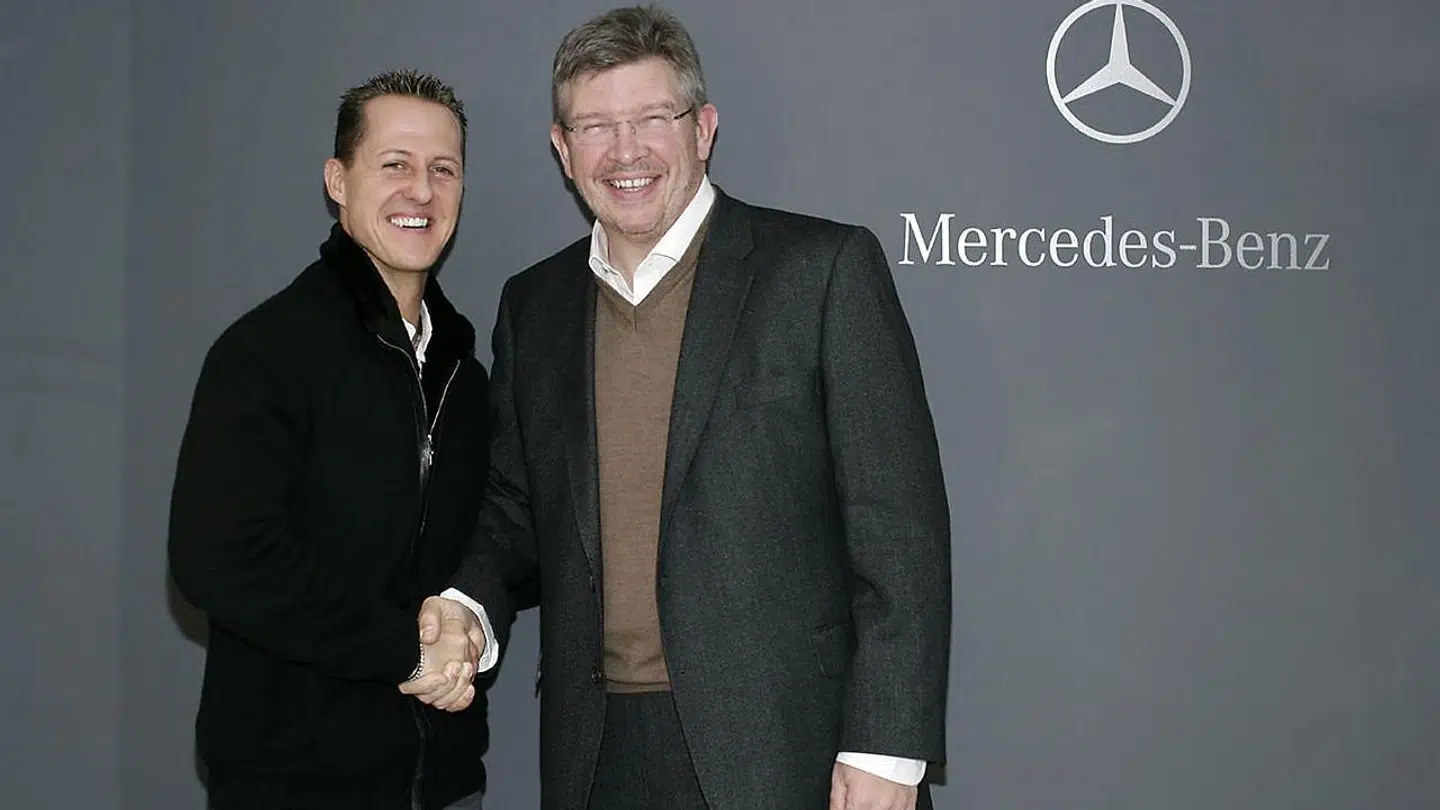 Michael Schumacher (tv.) og Ross Brawn (th.) fotograferet sammen i 2009.