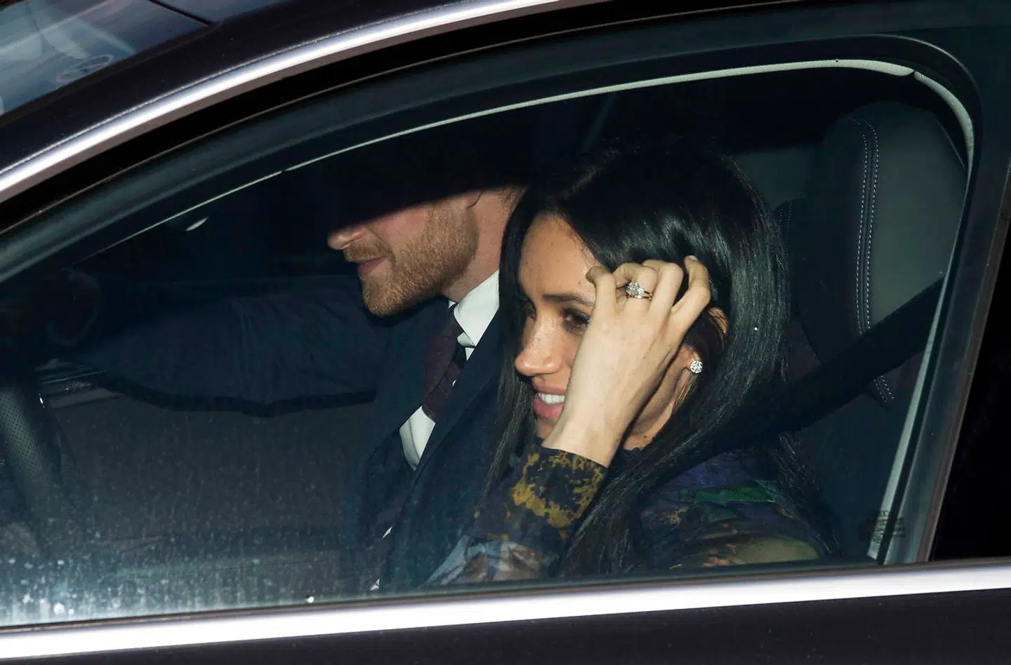 epa07240300 Britain's Prince Harry (L), Duke of Sussex and Meghan (R), Duchess of Sussex leave after the annual Christmas lunch at Buckingham Palace in London, Britain, 19 December 2018. EPA/NEIL HALL