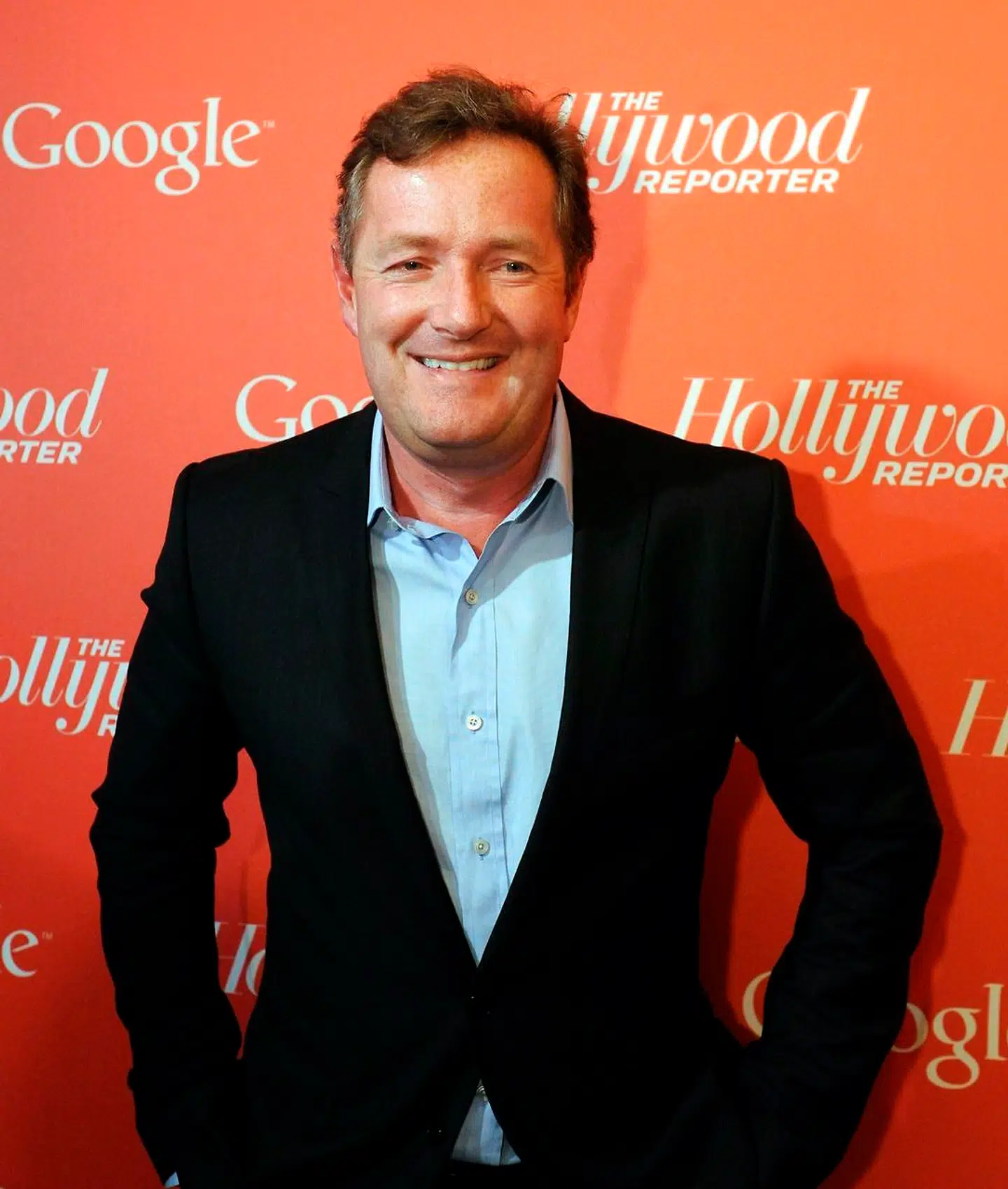 (FILES)CNN's Piers Morgan arrives at a red carpet event hosted by Google and the Hollywood Reporter on the eve of the annual White House Correspondents' Association dinner in Washington in this April 27, 2012 file photo. US gun rights advocates have signed a White House petition calling for British CNN host Piers Morgan to be deported for allegedly attacking the Second Amendment rights of ordinary Americans. The outspoken former British tabloid editor has launched something of a personal crusade for greater gun control measures in the wake of the December 14 massacre at Sandy Hook elementary in Newtown, Connecticut. On December 18, 2012, Morgan held an especially contentious interview with executive director of Gun Owners of America Larry Pratt, appearing to become incensed and incredulous when Pratt suggested more, not fewer, weapons as the solution. AFP PHOTO / Nicholas KAMM / FILES