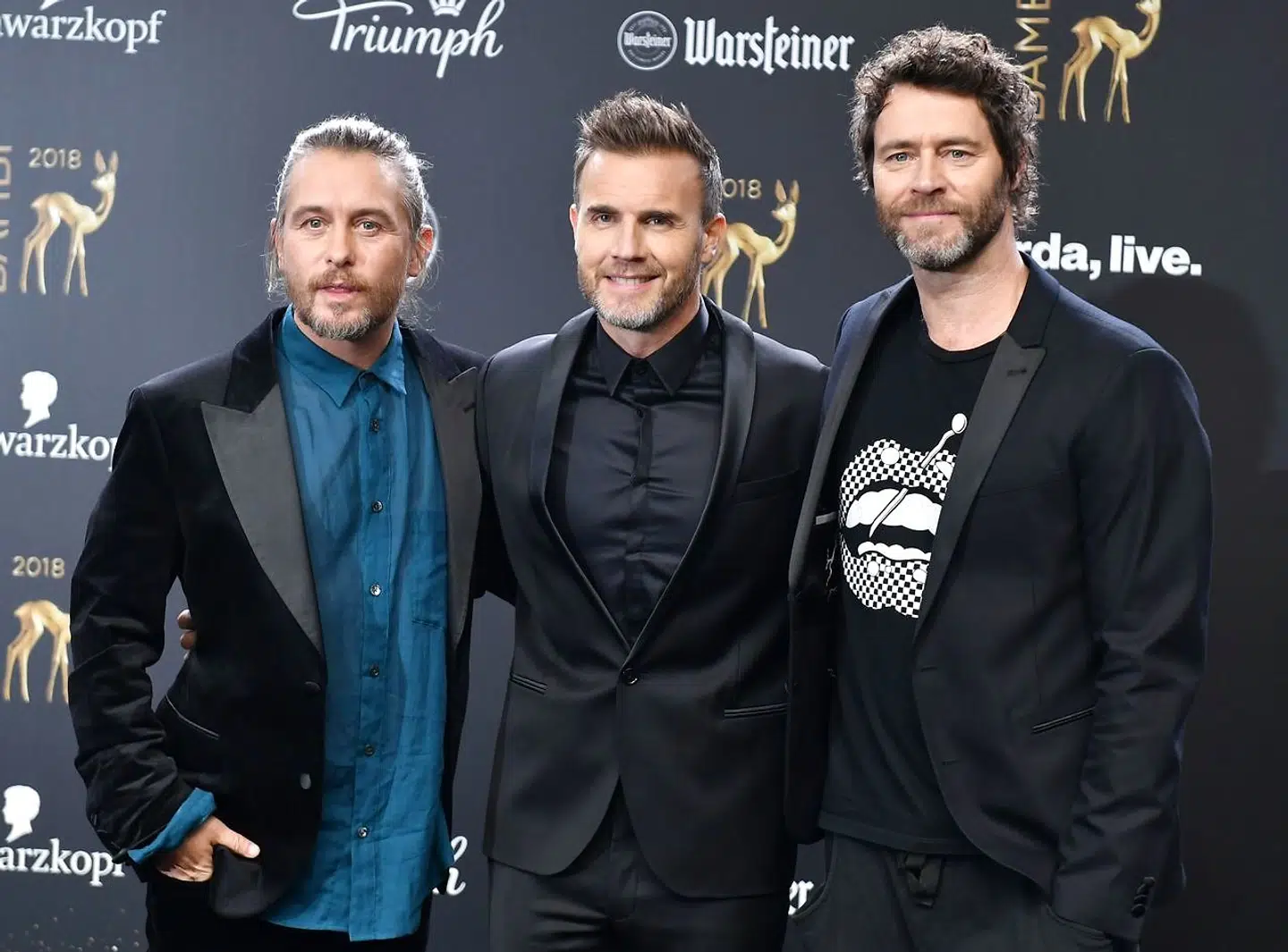 Take That består i dag af Mark Owen, Gary Barlow og Howard Donald.
