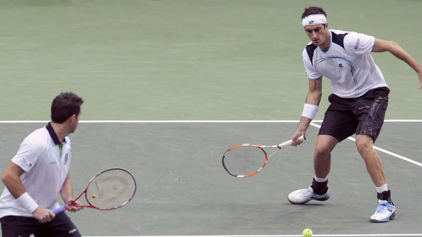 Potito Starace (th.) og Daniele Bracciali nåede French Open-kvartfinalen sammen i 2012. Michal Cizek/arkivfoto./Ritzau Scanpix