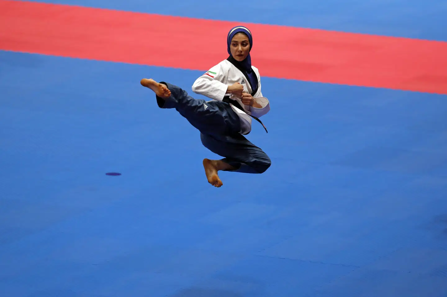 Her ses den iranske taekwondokæmper Marjan Salahshouri udføre en poomse under Asian Games tidligere på året. Cathal Mcnaughton / arkiv/Reuters