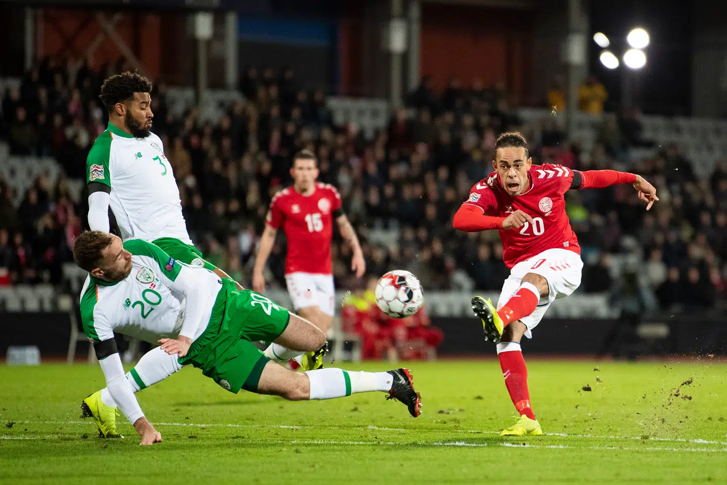 Denmark's Yussuf Poulsen (20) finishes against Ireland's Richard Keogh (20) and Cyrus Christie (3) during the Nations League soccer match between Denmark and Ireland at Ceres Park in Aarhus, Monday, November 19, 2018. (Photo: Bo Amstrup / Ritzau Scanpix )