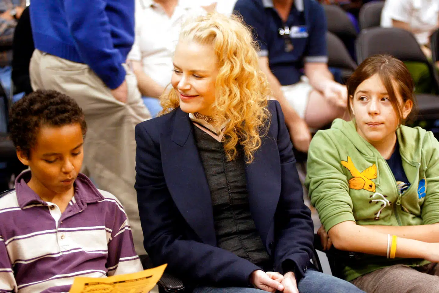 Australian actress Nicole Kidman and her children Connor (L) and Isabella (R) attend a game between the Los Angeles Lakers and the Miami Heat at the Staples Center 25 December 2004 in Los Angeles, California. Matthew Simmons/Getty Images/AFP