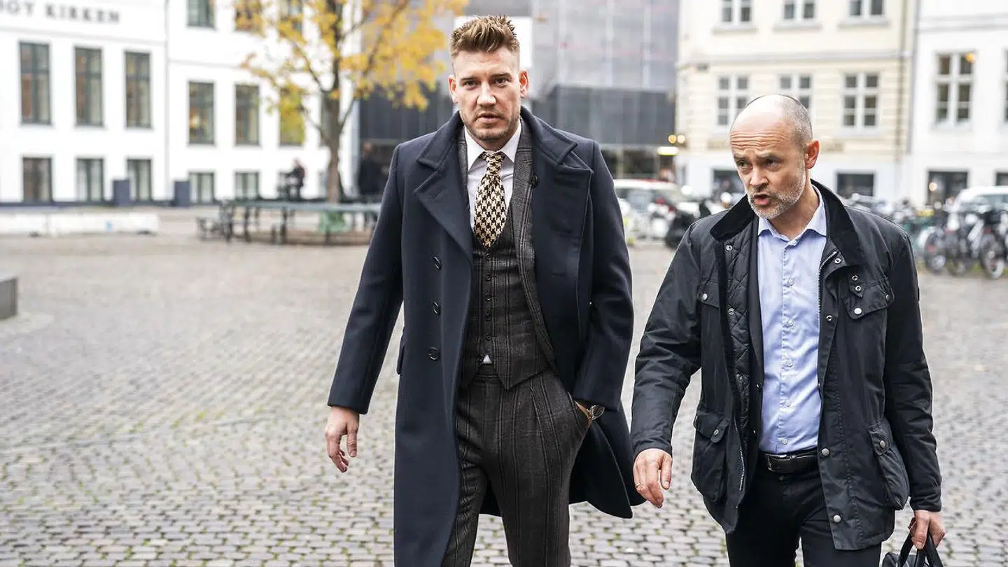 Nicklas Bendtner ankommer til Københavns Byret med sin advokat Anders Nemeth.