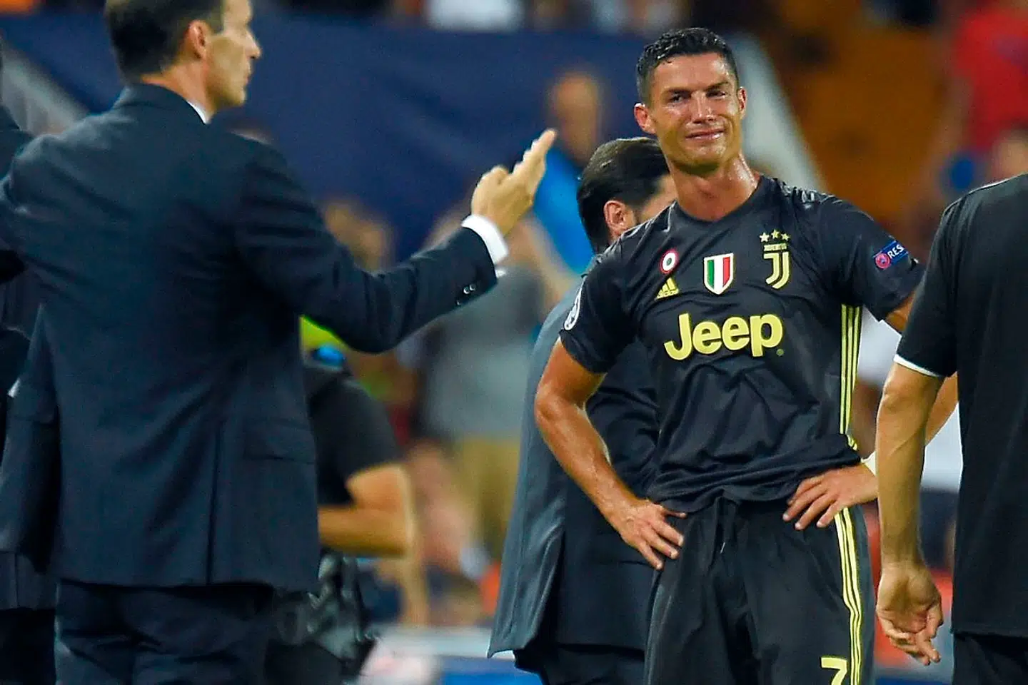 Juventus' Portuguese forward Cristiano Ronaldo reacts after receiving a red card during the UEFA Champions League group H football match between Valencia CF and Juventus FC at the Mestalla stadium in Valencia on September 19, 2018. (Photo by JOSE JORDAN / AFP)