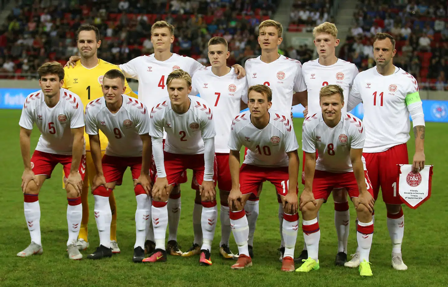 Denmark's amateur players pose for the team photo prior the friendly soccer match between Slovakia and Denmark in Trnava, Slovakia, Wednesday, Sept. 5, 2018. Every player in Denmark's squad are uncapped following a dispute between Denmark's star players and the Danish Football Association. Up from left: Denmark's Keeper Christoffer Haagh, Christian Bannis, Kasper Kempel, Daniel Nielsen, Nicolai Johansen, Christian Offenberg. Down from left: Mads Priisholm Bertelsen, Oskar Hoybye, Simon Vollesen, Rasmus Gaudin, Rasmus Johansson. (AP Photo/Ronald Zak)