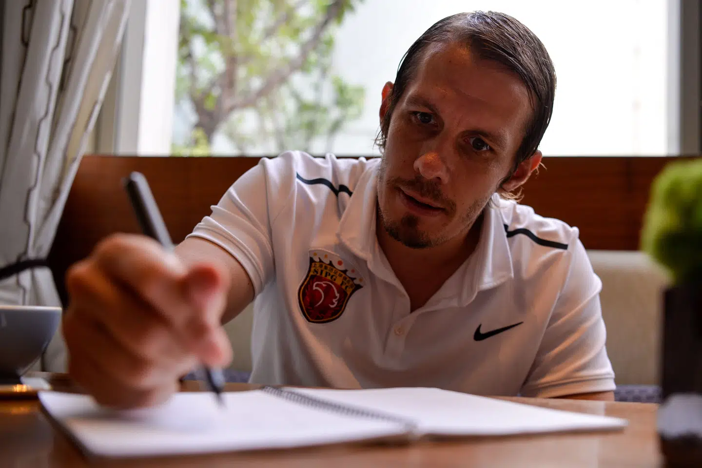 Efter fire år i Shanghai SIPG søger Mads Davidsen nye græsgange. Chandan Khanna/Ritzau Scanpix