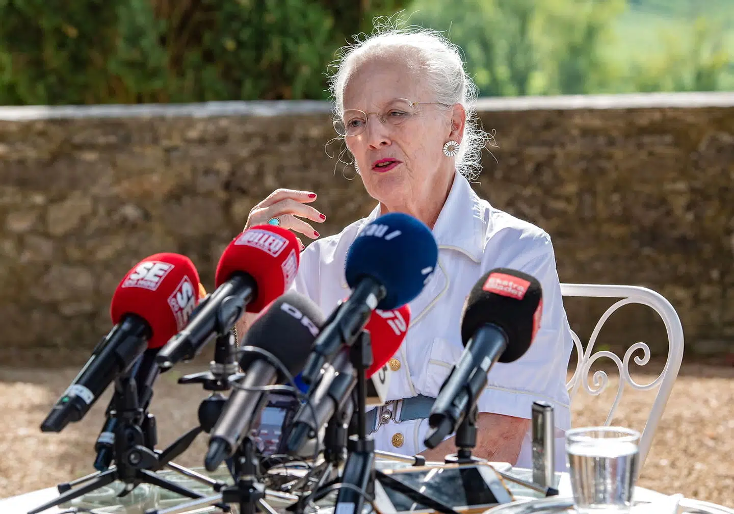 epa06952439 Queen Margrethe II of Denmark attends a press conference and photocall at Chateau de Cayx, near Cahors, France, 16 August 2018. Cayx Palace is a residence of the Danish Royal Family where the Danish monarch is residing for a few weeks in August. EPA/CAROLINE BLUMBERG