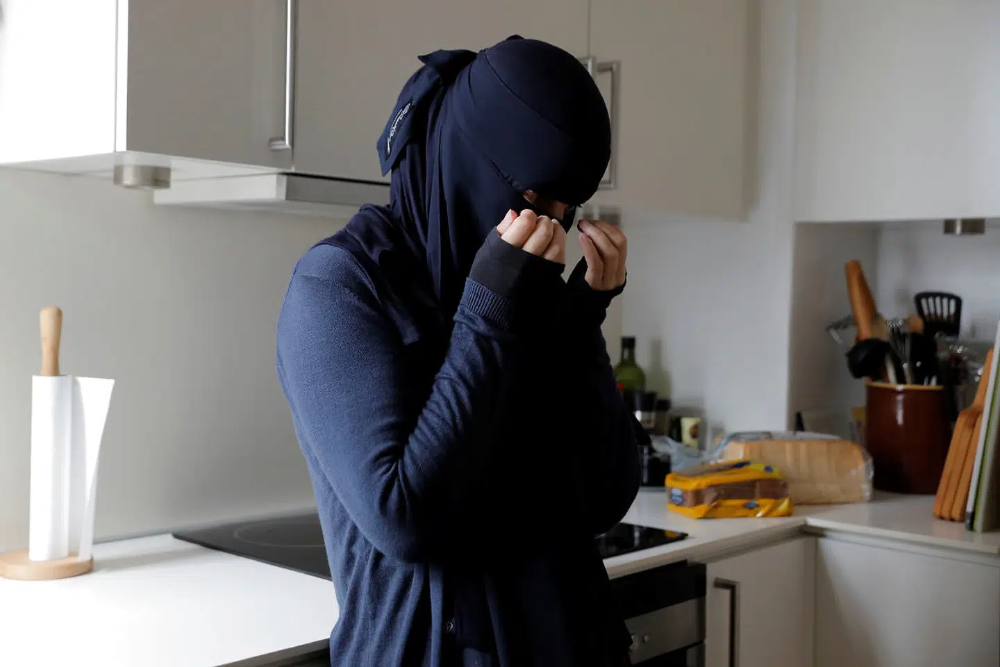 Ayah var grædefærdig, da Reuters mødte hende inden demonstrationen.