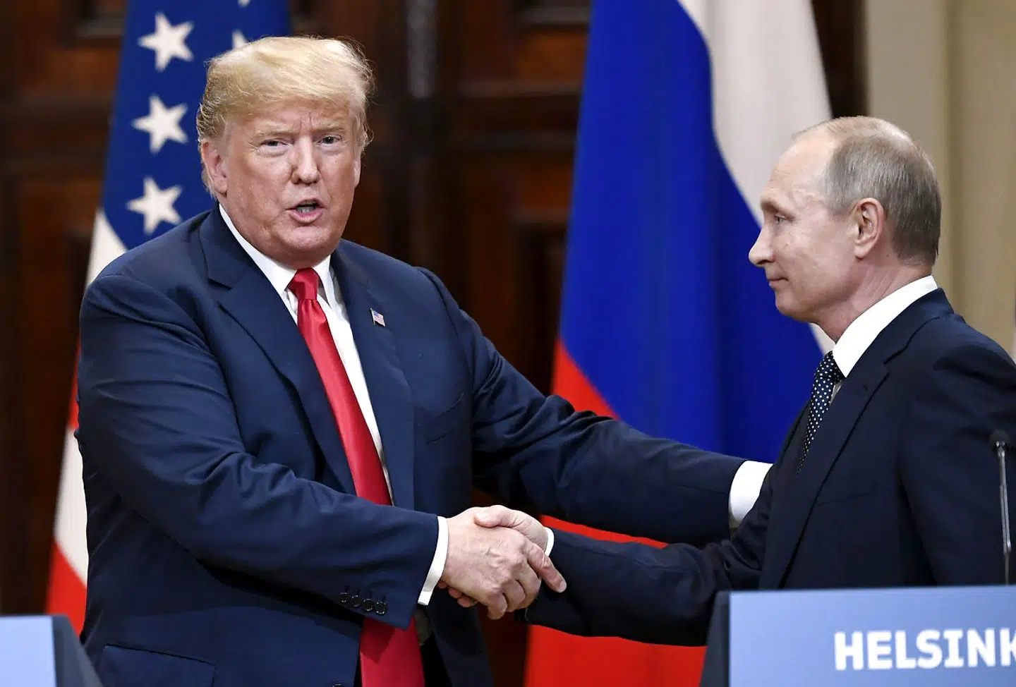 U.S. President Donald Trump and Russia's President Vladimir Putin shake hands after their joint news conference in the Presidential Palace in Helsinki, Finland July 16, 2018. Lehtikuva/Antti Aimo-Koivisto via REUTERS ATTENTION EDITORS - THIS IMAGE WAS PROVIDED BY A THRID PARTY. FINLAND OUT.NO THIRD PARTY SALES.