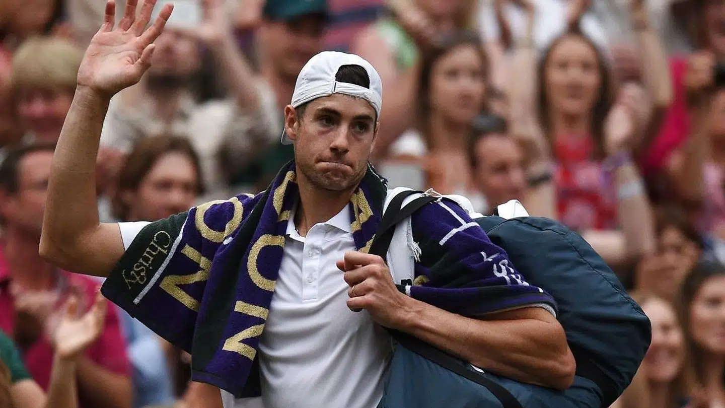 John Isner siger farvel.
