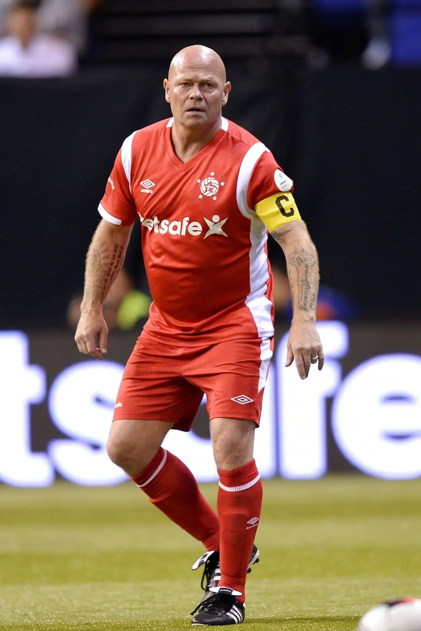 Stig Tøfting i fodboldtøjet. / AFP PHOTO / OLLY GREENWOOD