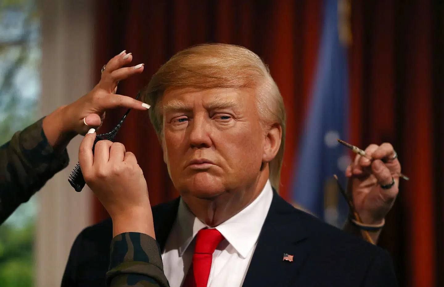 Medarbejdere hos Madame Tussauds i London er her i gang med at færdiggøre en model af den amerikanske præsident.