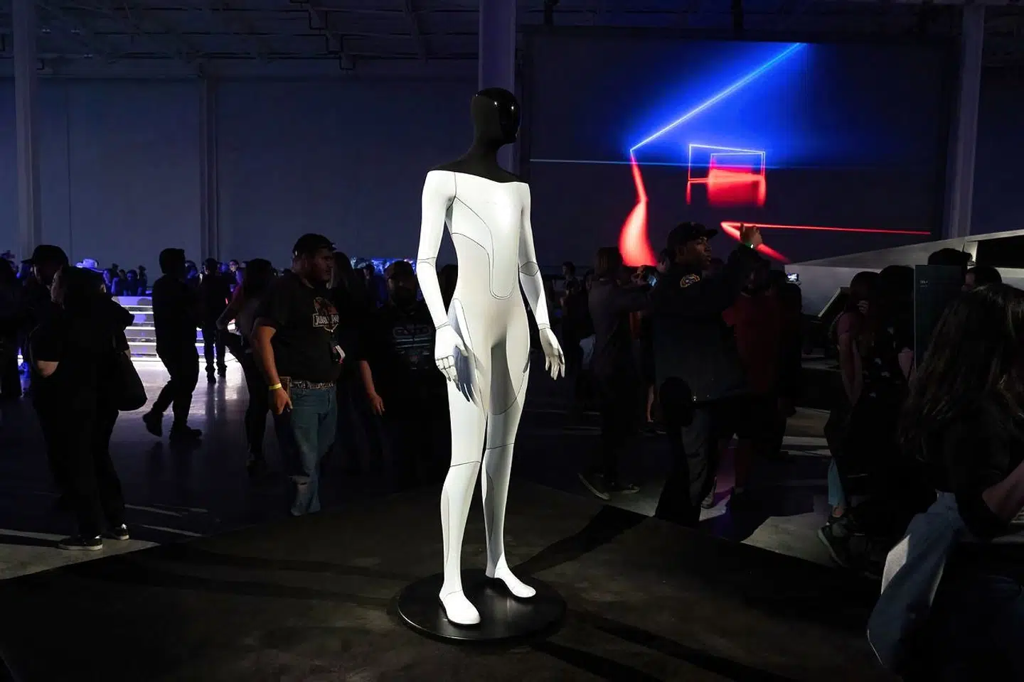 The Tesla Bot is on display at the Tesla Giga Texas manufacturing facility during the "Cyber Rodeo" grand opening party on April 7, 2022 in Austin, Texas. - Tesla welcomed throngs of electric car lovers to Texas on April 7 for a huge party inaugurating a "gigafactory" the size of 100 professional soccer fields. (Photo by SUZANNE CORDEIRO / AFP)