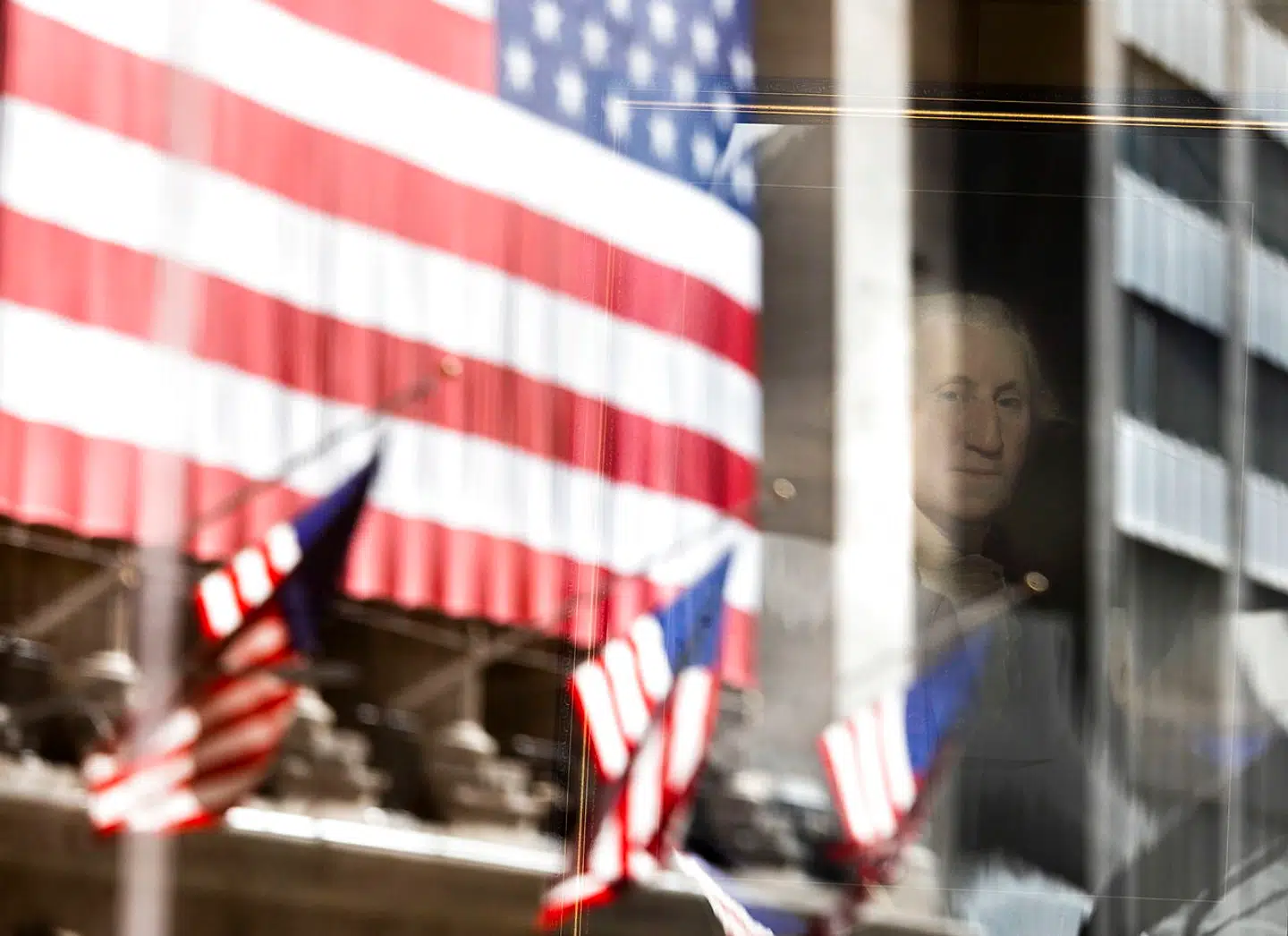 epaselect epa08798899 A portrait of President George Washington in Federal Hall is see with a reflection of the New York Stock Exchange on Wall Street in New York, New York, USA, on 04 November 2020. The Dow Jones industrial average was up over 2% today and global investors are closely watching developments in the undecided United States' presidential election between President Donald J. Trump and former Vice President Joe Biden. EPA/JUSTIN LANE