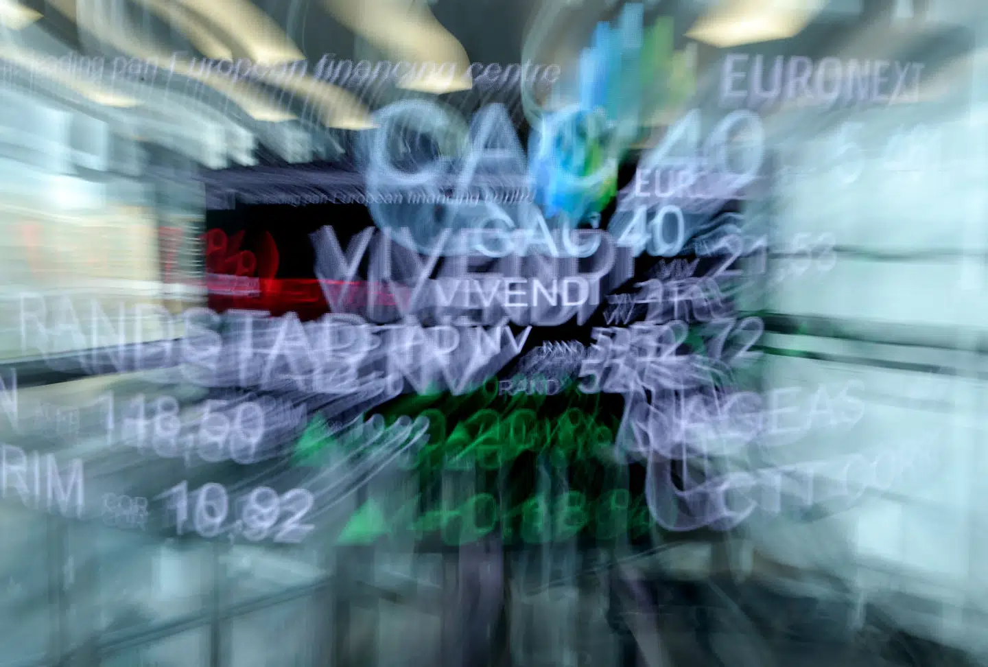 A picture taken with a zoom effect shows the CAC 40 amongst stock tickers displayed at the headquarters of the Pan-European stock exchange Euronext in La Defense district, near Paris, on April 27, 2018. ERIC PIERMONT / AFP