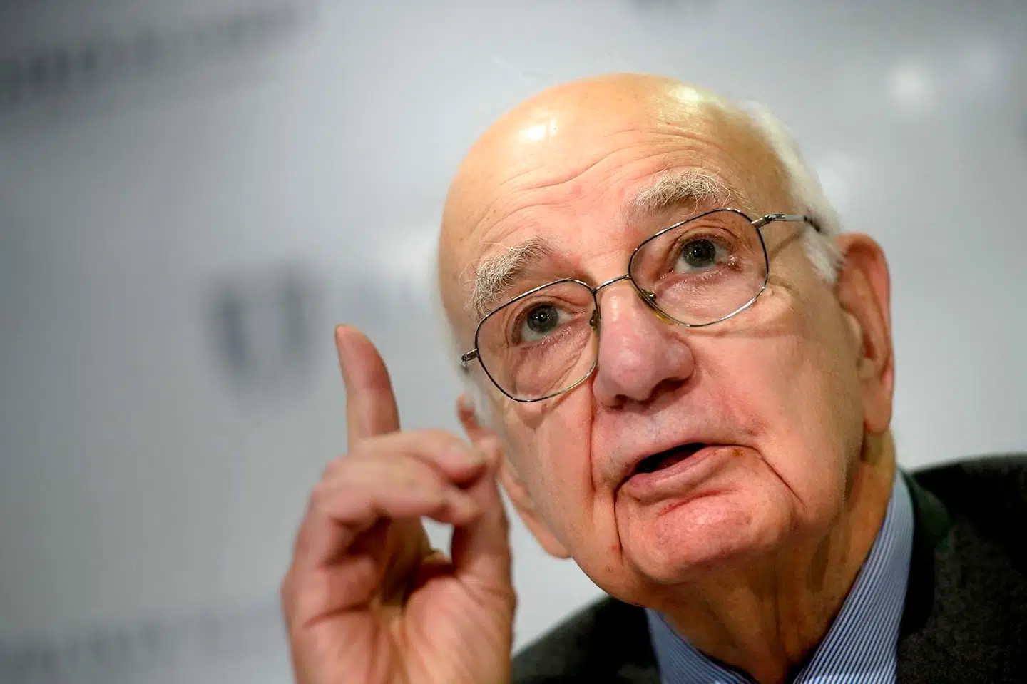 (FILES) In this file photo taken on April 20, 2015 Paul Volcker, former Federal Reserve chairman, speaks at the National Press Club in Washington, DC. - Hubris, growing distrust in government and growing concentration of wealth worry the elder statesman of American central banking enough that in his ninth decade he has written a memoir to sound a warning. Paul Volcker, 91, the towering Federal Reserve chief who defeated inflation - - literally towering, he is a few inches shy of seven feet tall - - laments the breakdown of governance and policymaking. (Photo by Brendan SMIALOWSKI / AFP)