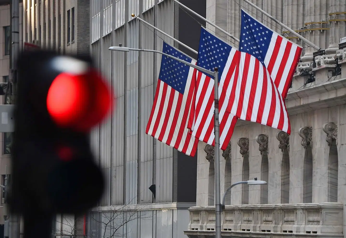 New York Stock Exchange (NYSE) at Wall Street on January 12, 2021 in New York City. - US stocks on January 11. 2021 retreated from records set last week as political uncertainty, including efforts to remove President Donald Trump from power, has finally shaken investors. (Photo by Angela Weiss / AFP)
