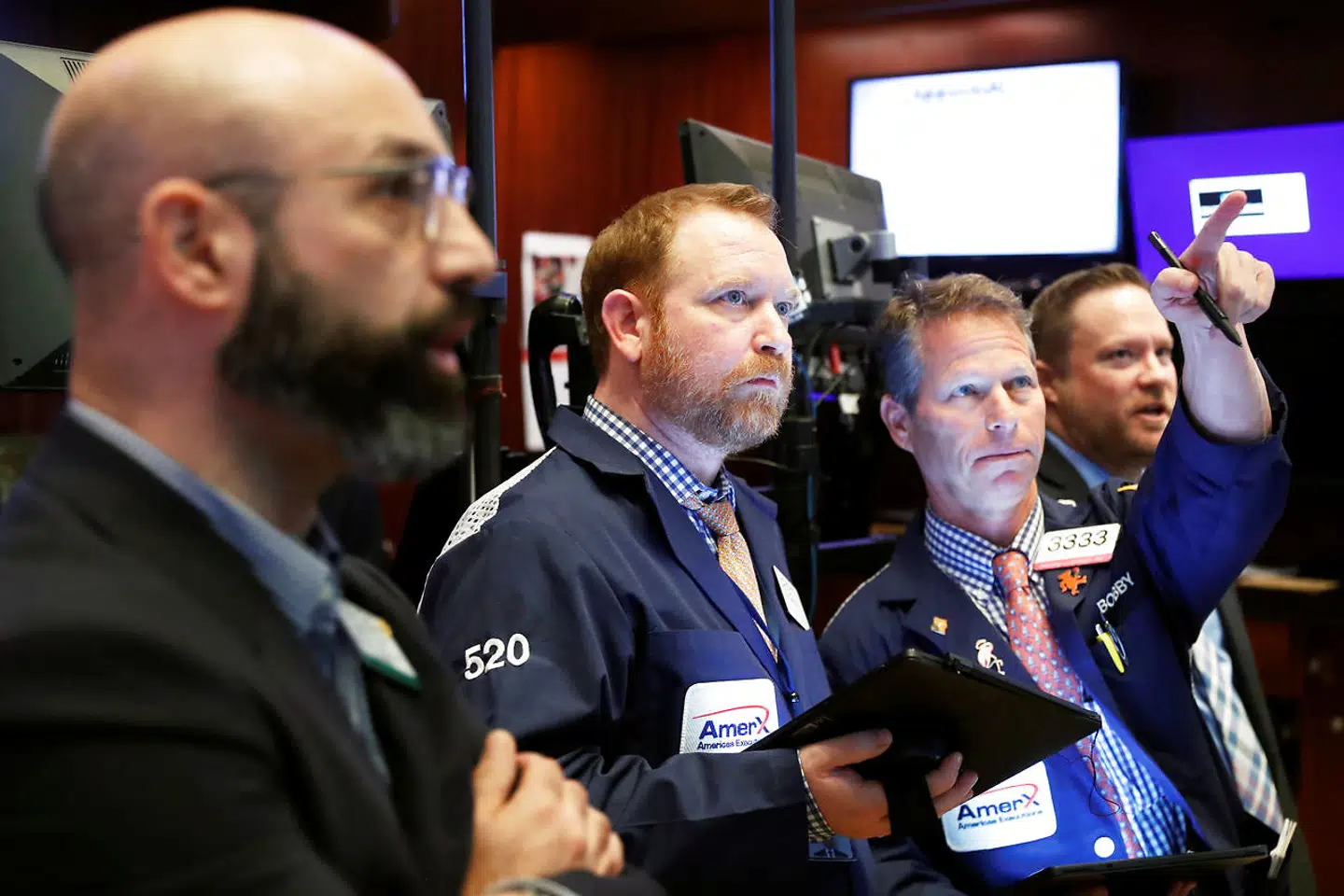 Her ses børshandlere hos New York Stock Exchange.