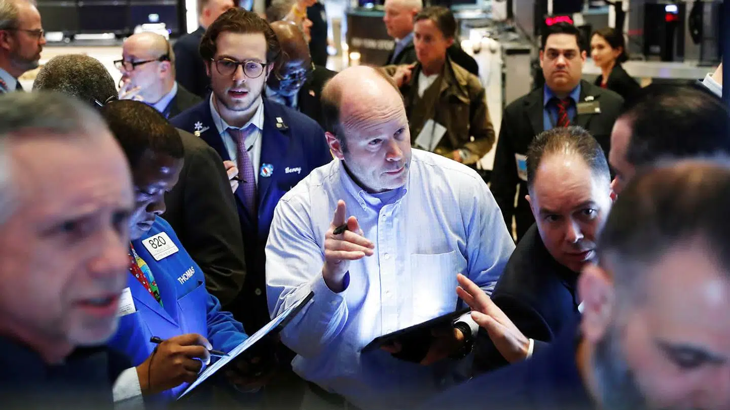 Her ses børsmæglere på New York Stock Exchange.