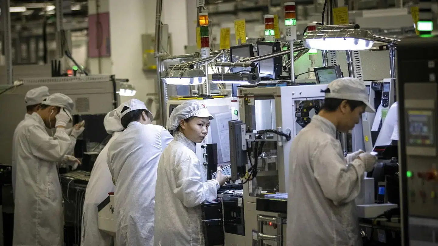 Her ses Huawei-ansatte på et af det kinesiske selskabs fabrikker i Kina
