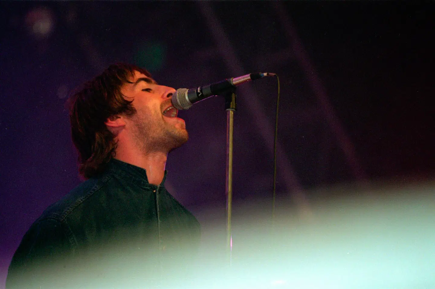 Liam Gallagher er frontfigur i den britiske band Oasis, der også var på plakaten i 1995.