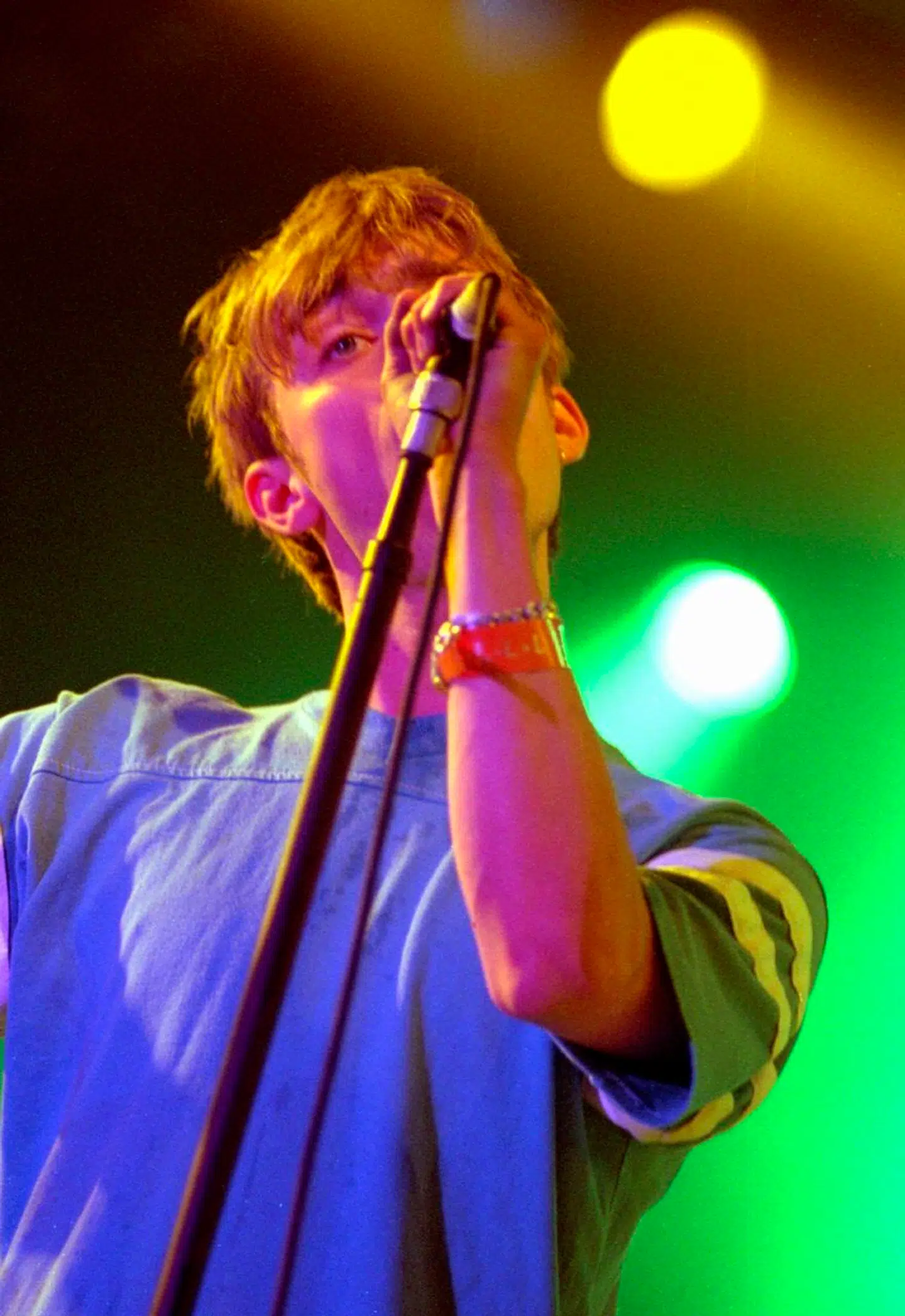 Damon Albarn er forsanger i det britiske band Blur, der var en del af festivalen i 1995.