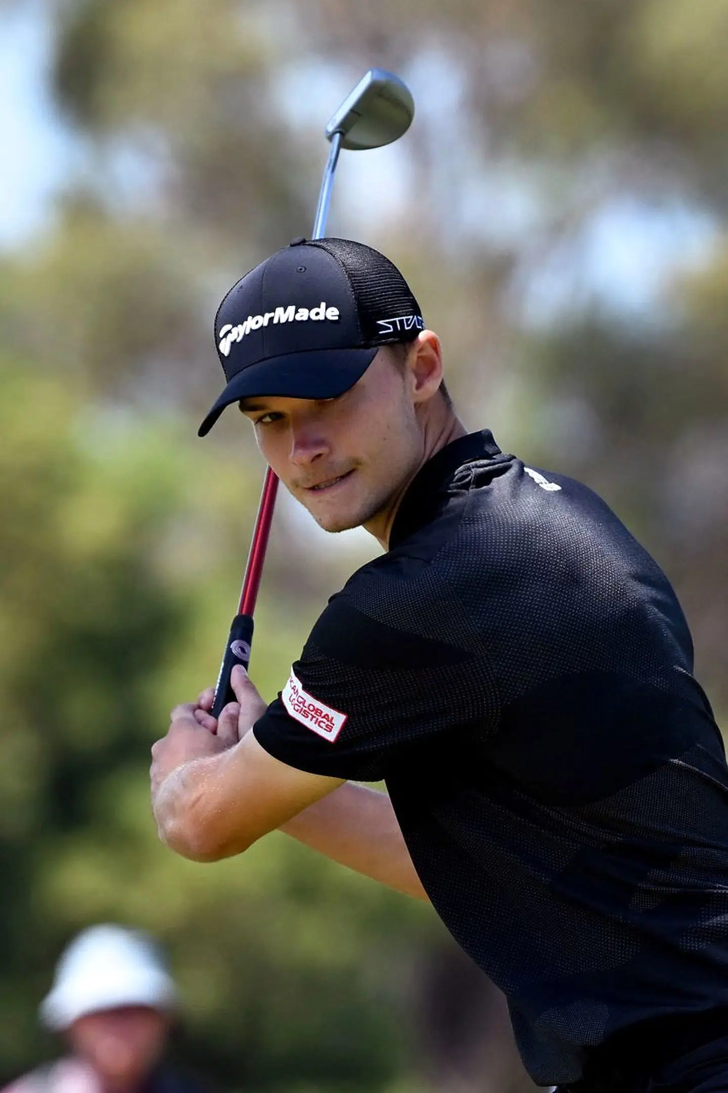 Nicolai Højgaard reagerer her på et skidt slag med putteren på anden runde i Australian Open.
