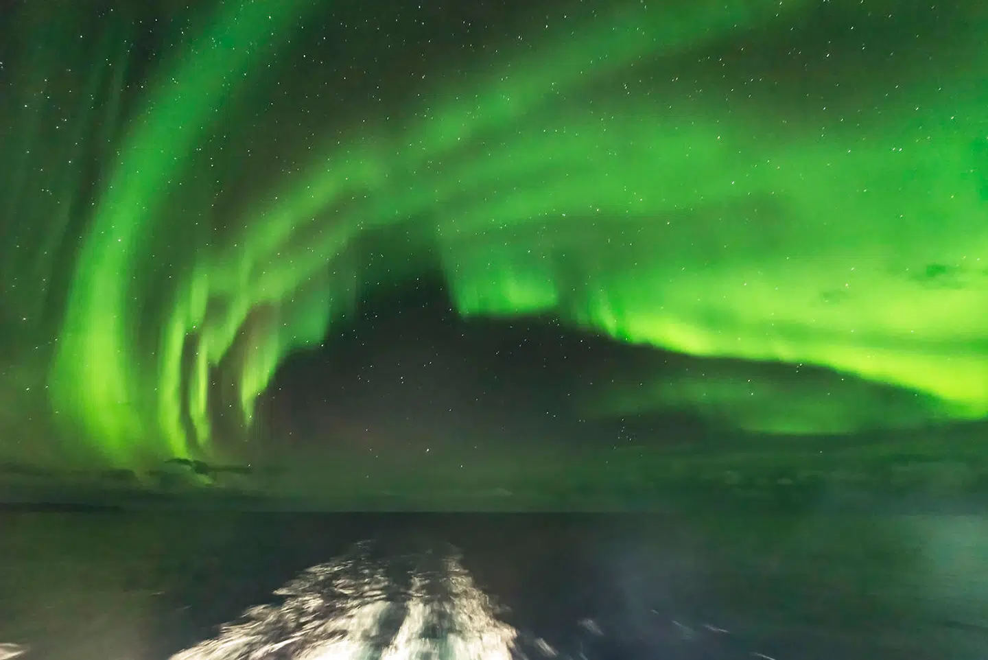 Auroral curtains from the deck of the m/s Nordlys on October 25, 2017, looking northeast toward the Big Dipper at right. Arcturus is setting a left of centre. (Alan Dyer / VWPics via AP Images)