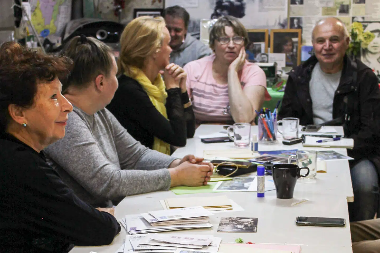 In a Yekaterinburg basement the local section of the human rights organisation Memorial is still holding the fort. At the back is journalist Yelena Shukayeva who owes the Russian state 200,000 roubles in fines for criticising the army and the war in Ukraine.