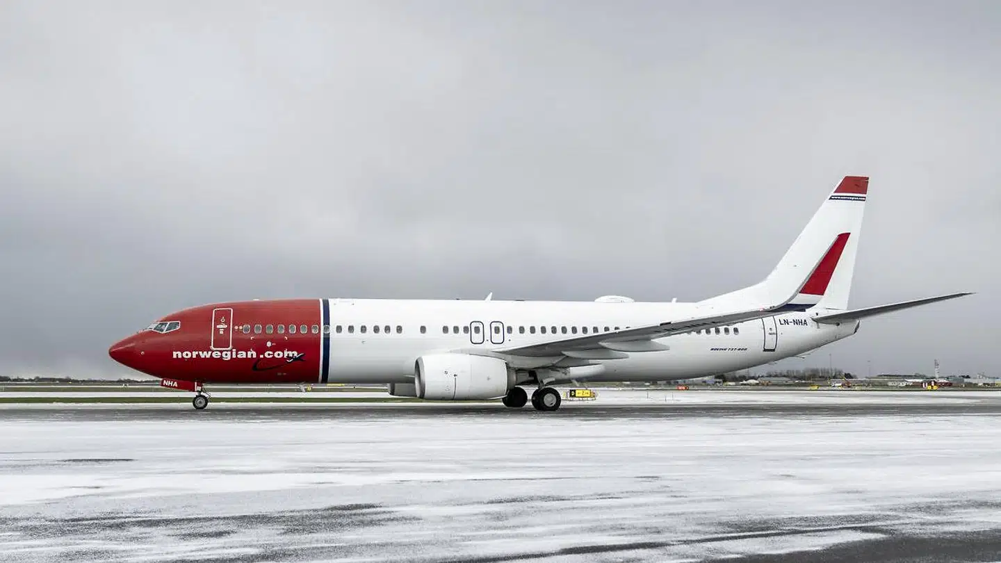 Det norske lavprisselskab Norwegian nyder godt at ekstra passagerer under SAS-strejken.