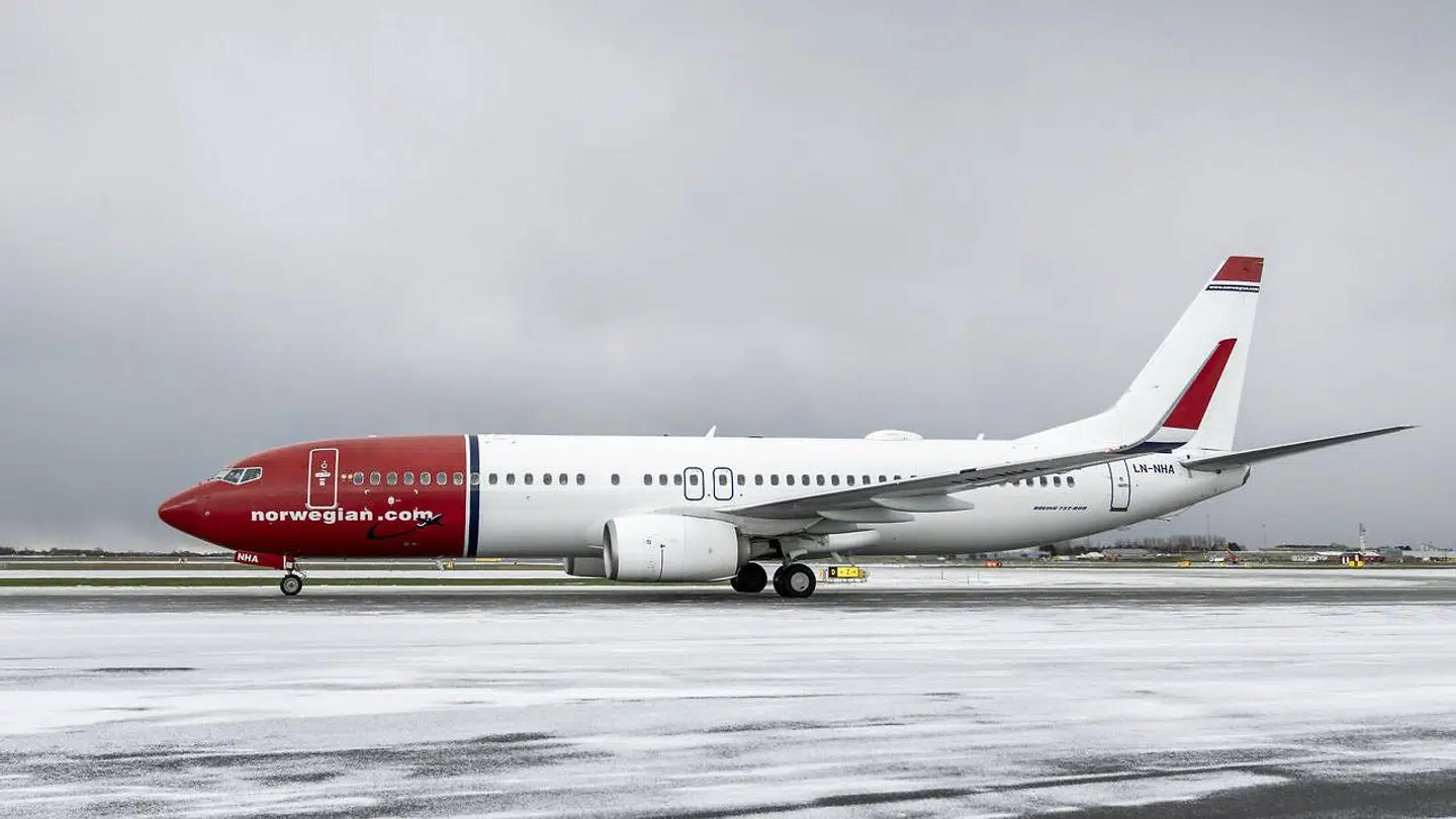 Det norske lavprisselskab Norwegian nyder godt at ekstra passagerer under SAS-strejken.