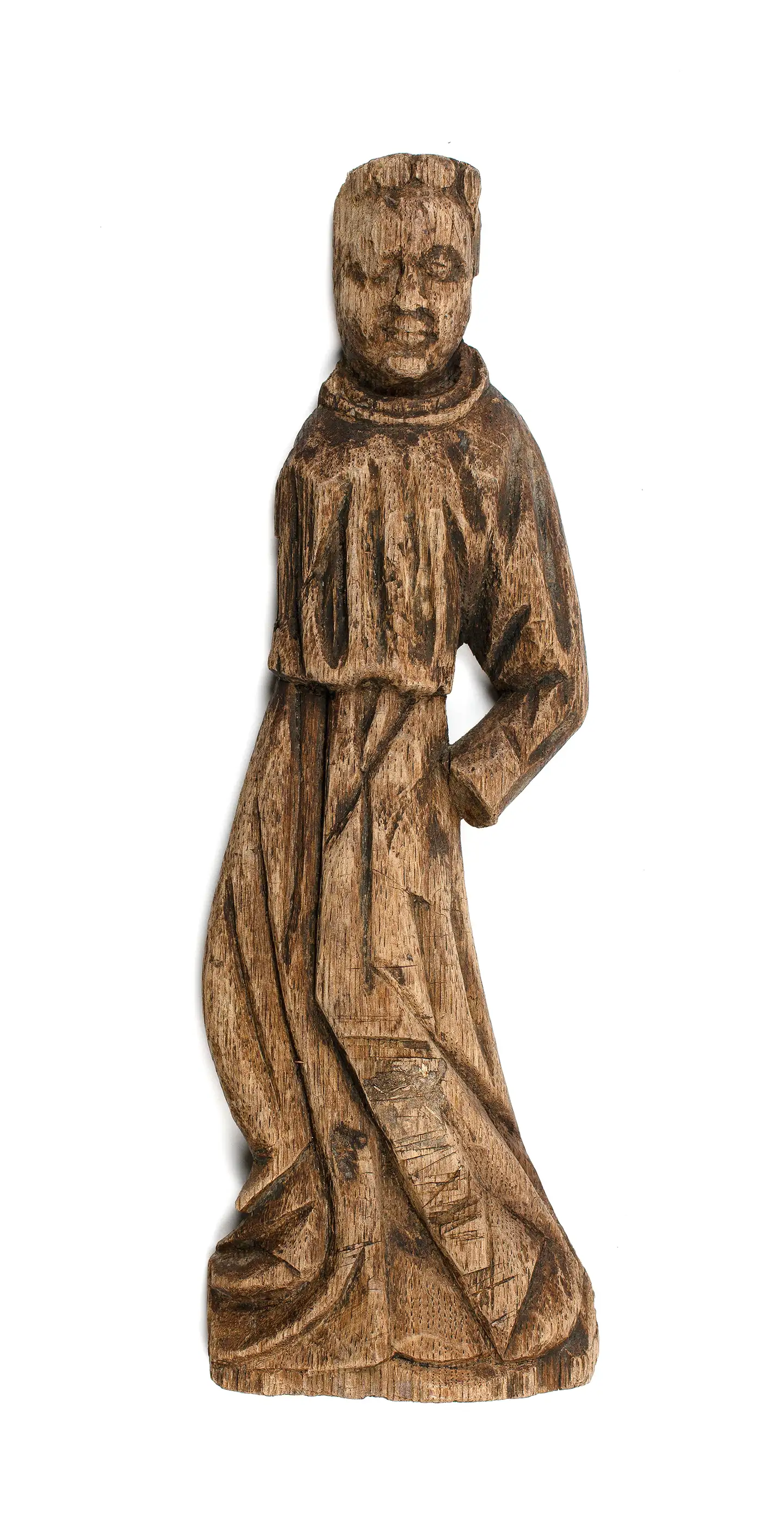 En træfigur, der blev fundet ved Højbro Plads. Den er fra 1300- eller 1400-tallet og forestiller en munk fra et kloster. Foto: Illustration fra bogen/Sille Juline Høgly Petersen.