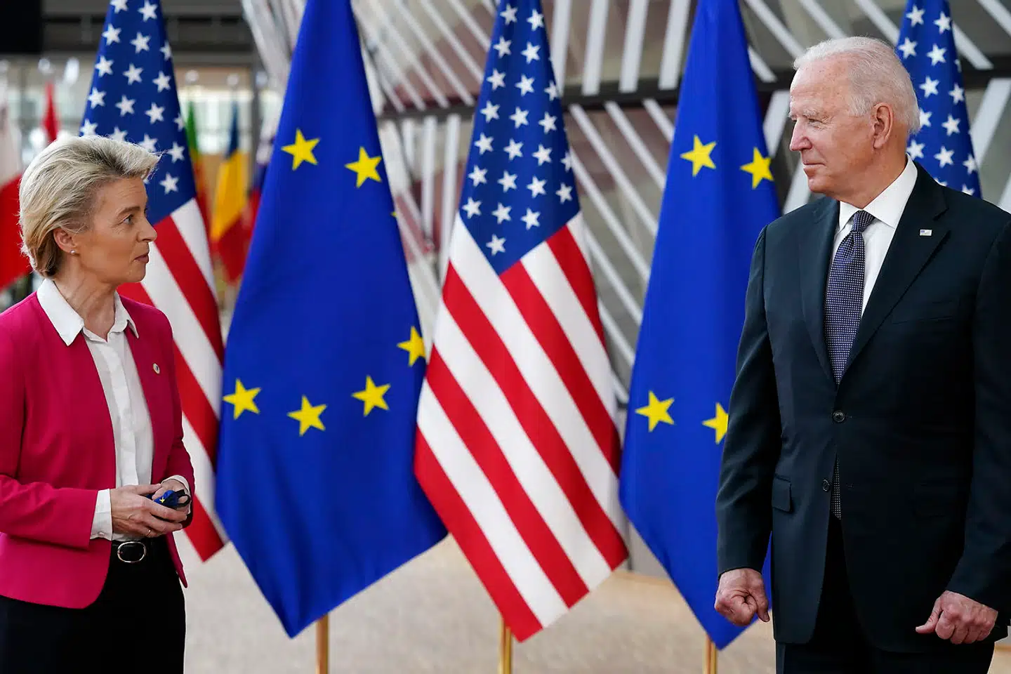European Commission President Ursula von der Leyen and President Joe Biden speak before participating in the United States-European Union Summit at the European Council in Brussels, Tuesday, June 15, 2021. (AP Photo/Patrick Semansky)