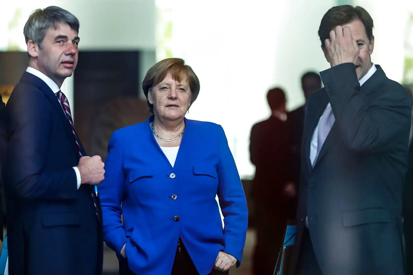 Tysklands kansler, Angela Merkel, ses her med Jan Hecker (tv.) i Berlin.