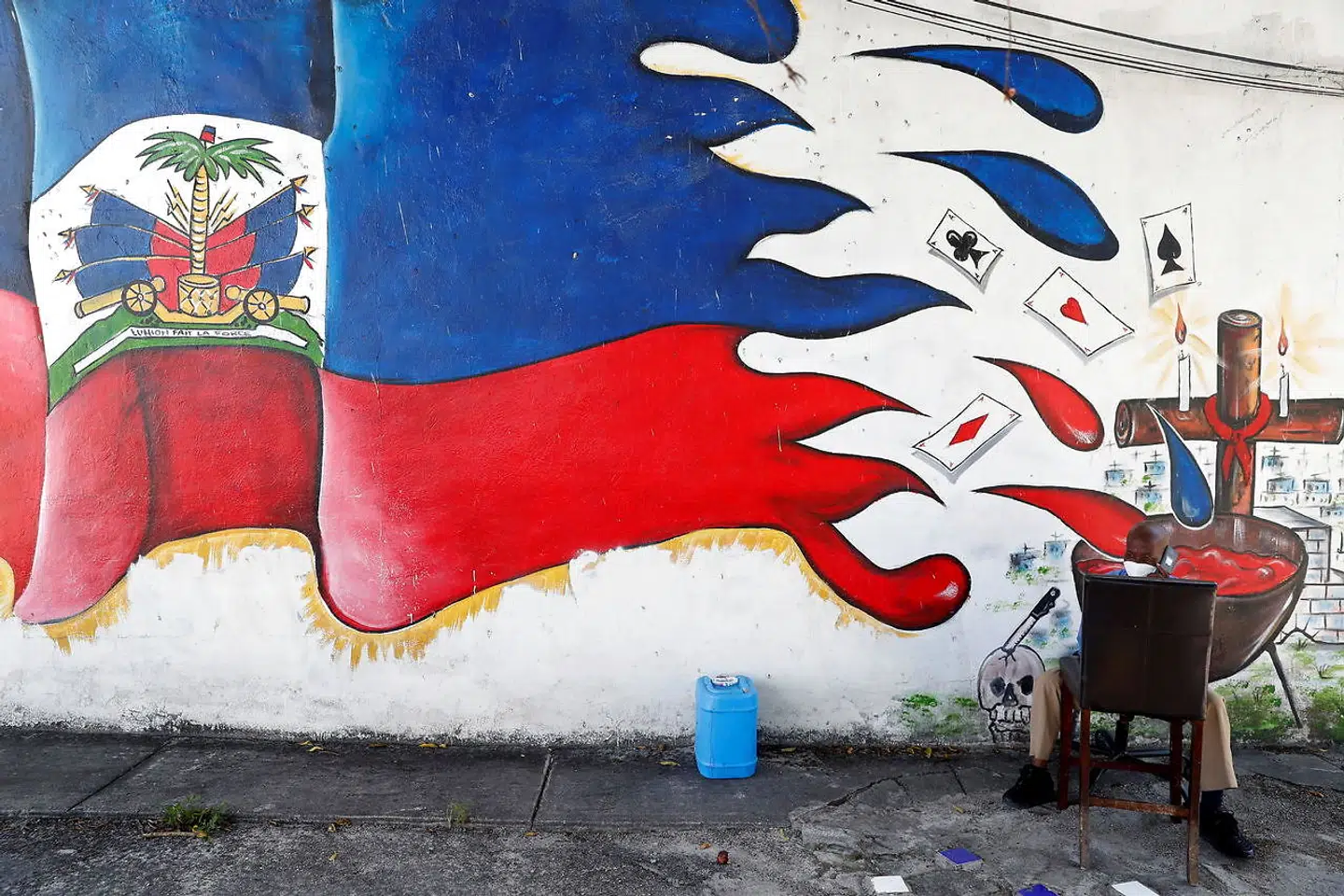 Haitis ekstremt blodige og kaotiske historie har givet landet tilnavnet »Djævelens heksekedel« – her fortolket på et murmaleri i Miamis Little Haiti-kvarter.