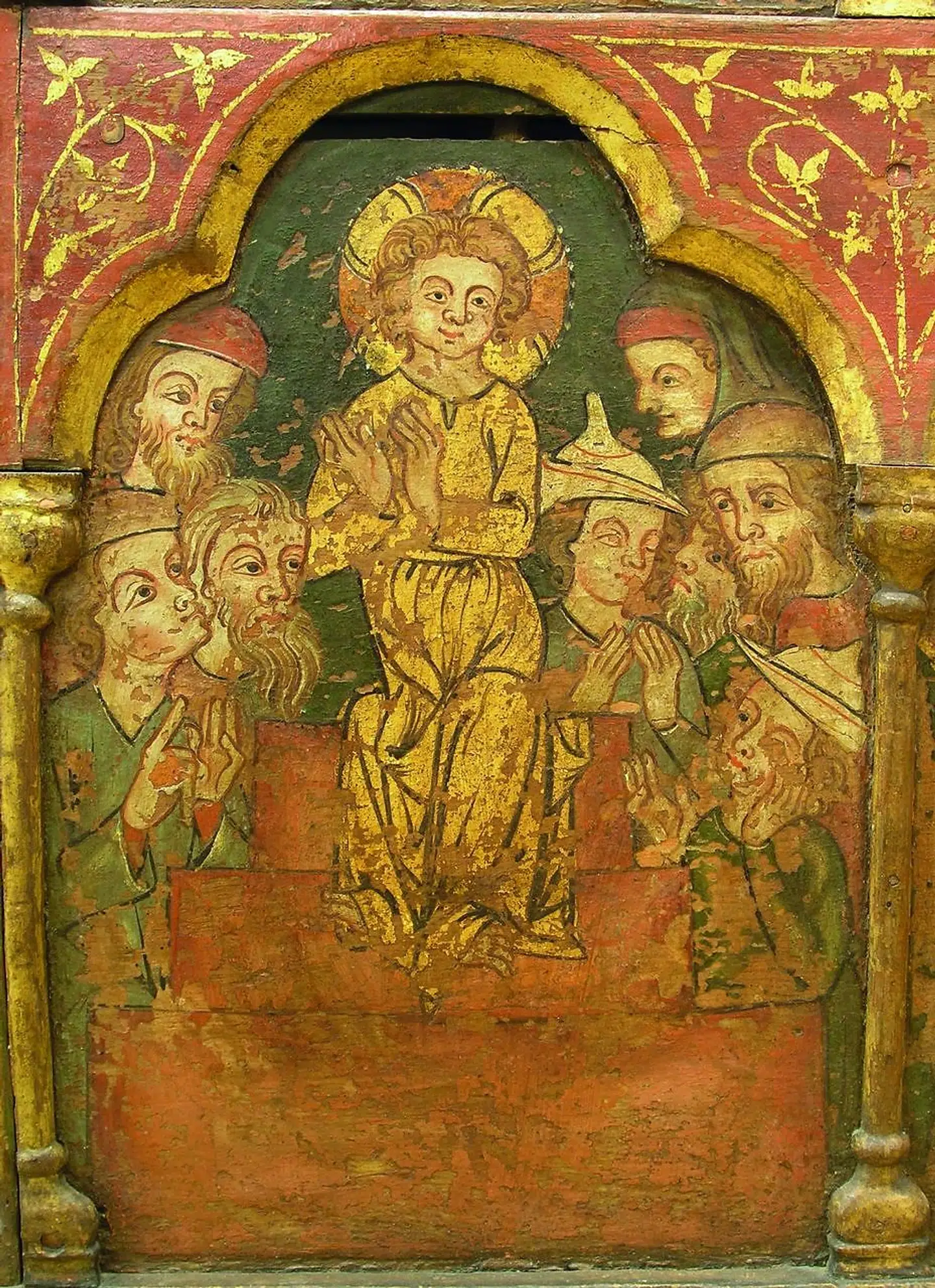 Jesus belærte de skiftlærde i Templet i Jerusalem, da han som 12-årig besøgte Templet. Denne scene er gengivet i Løgum Kloster på en tavle fra omkring 1325. På billedet ses Jesus i midten omgivet af de lærde. Illustration fra bogen.