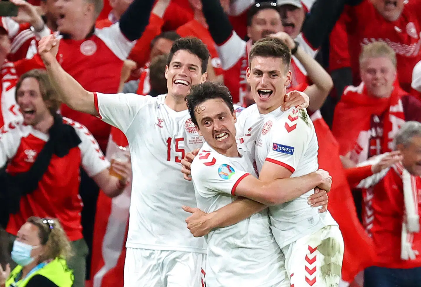 Soccer Football - Euro 2020 - Group B - Russia v Denmark - Parken Stadium, Copenhagen, Denmark - June 21, 2021 Denmark's Joakim Maehle celebrates scoring their fourth goal with Thomas Delaney and Christian Norgaard Pool via REUTERS/Wolfgang Rattay