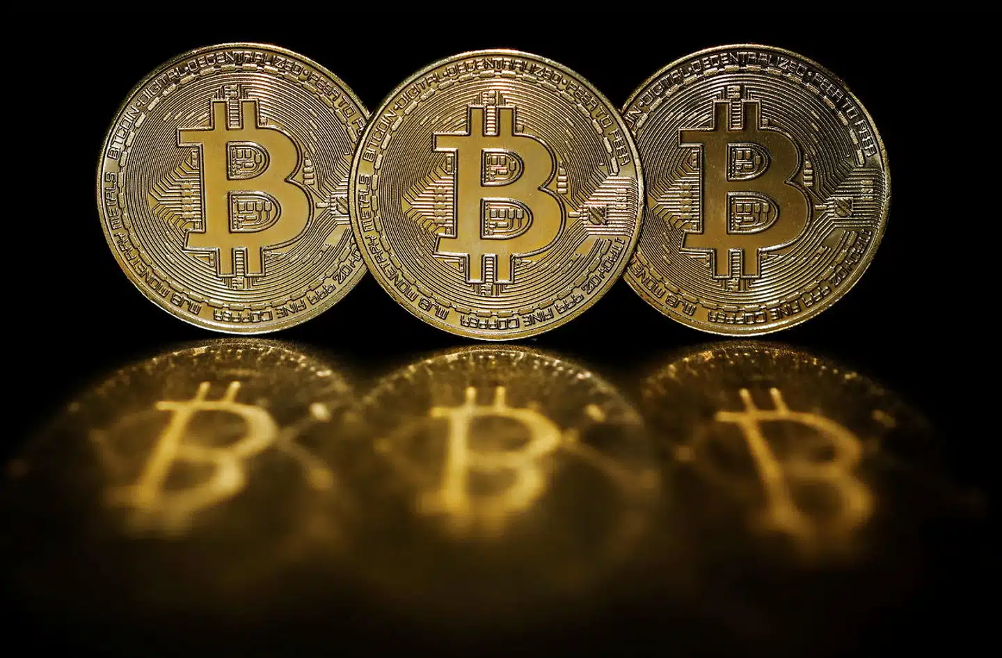 Bitcoin er en digital valuta, men sådan kunne mønterne se ud, hvis det var en fysisk valuta.