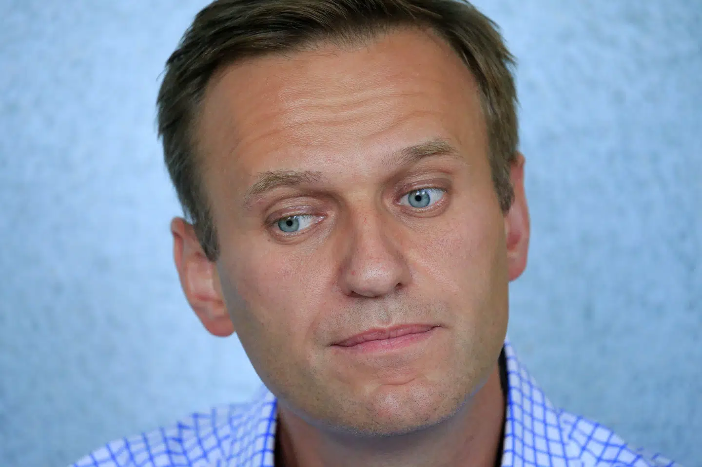 Den ledende Kreml-kritiker Aleksej Navalnyj vender søndag tilbage til Rusland fra Tyskland. Han vil formentlig blive anholdt allerede i lufthavnen, da myndighederne har gjort det klart, at han vil blive tilbageholdt. Tatyana Makeyeva/Reuters