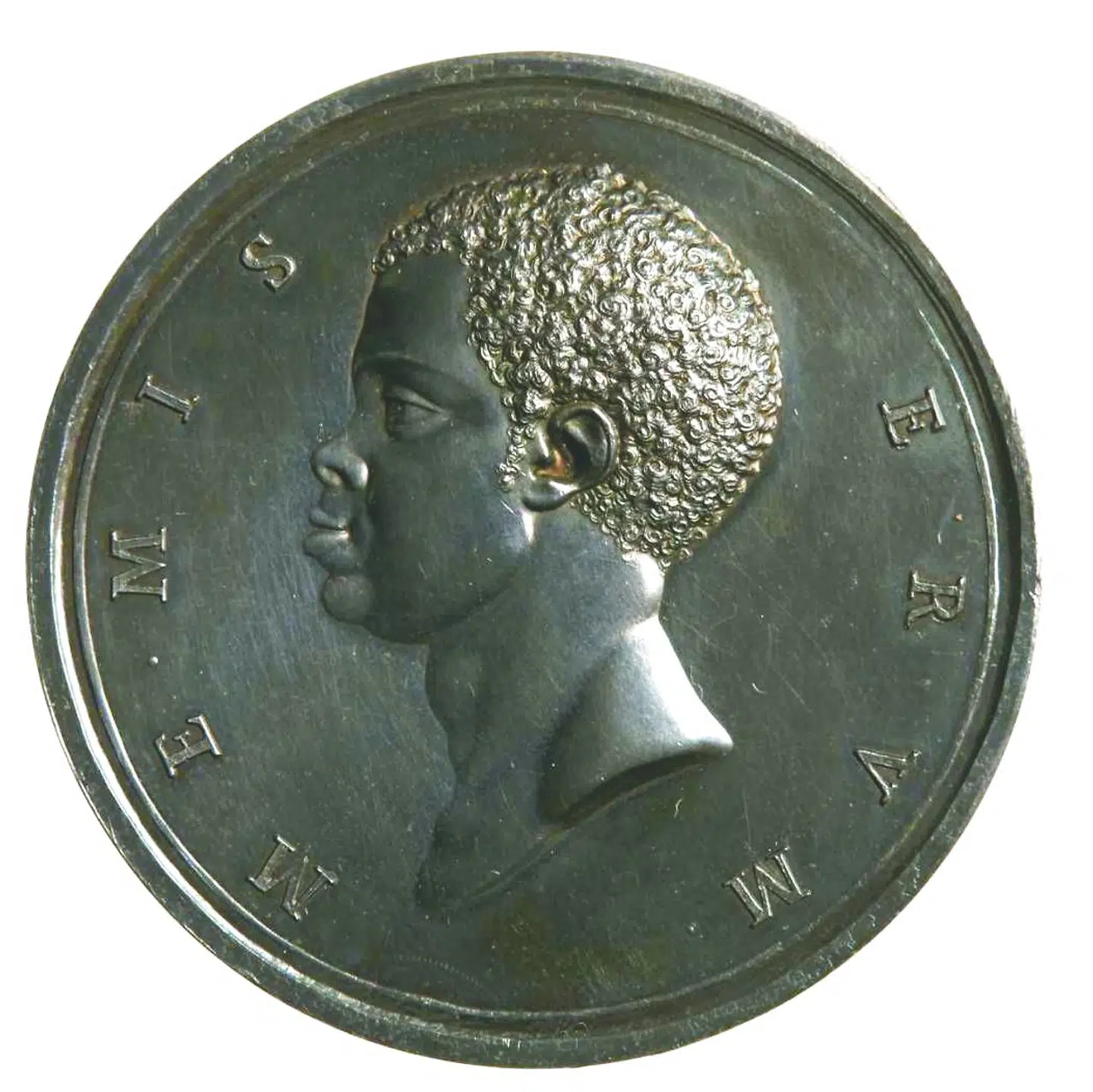 Nicolai Abildgaard tegnede den medalj, der skulle markere det danske forbud mod slavehandel i 1792. På forsiden ses en sort slave i profil og indskriften ME MISERUM (Jeg elendige).