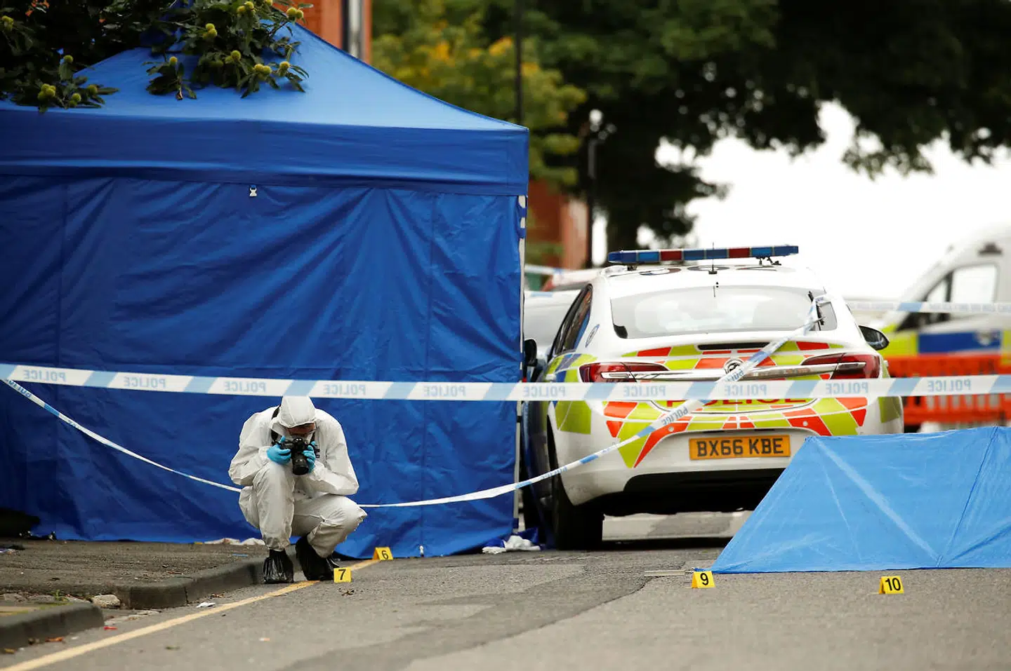 A forensic worker investigates at the scene of reported stabbings in Birmingham, Britain, September 6, 2020. REUTERS/Phil Noble