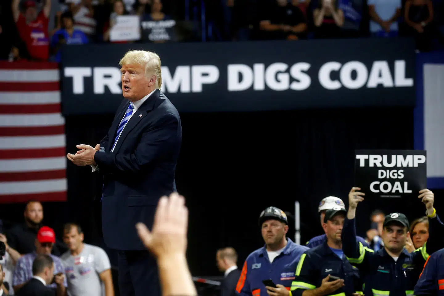FILE PHOTO: U.S. President Donald Trump acknowledges coal miners during a Make America Great Again rally at the Civic Center in Charleston, West Virginia, U.S., August 21, 2018. REUTERS/Leah Millis -/File Photo