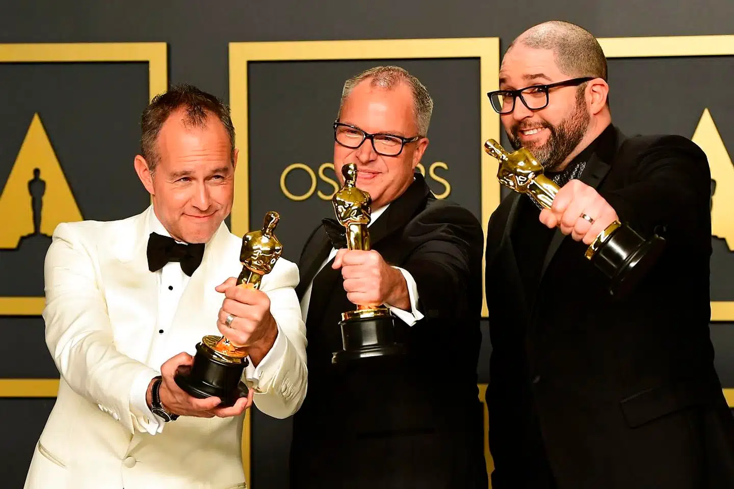 Jonas Rivera, Mark Nielsen og Josh Cooley efter at have vundet Bedste Animationsfilm.